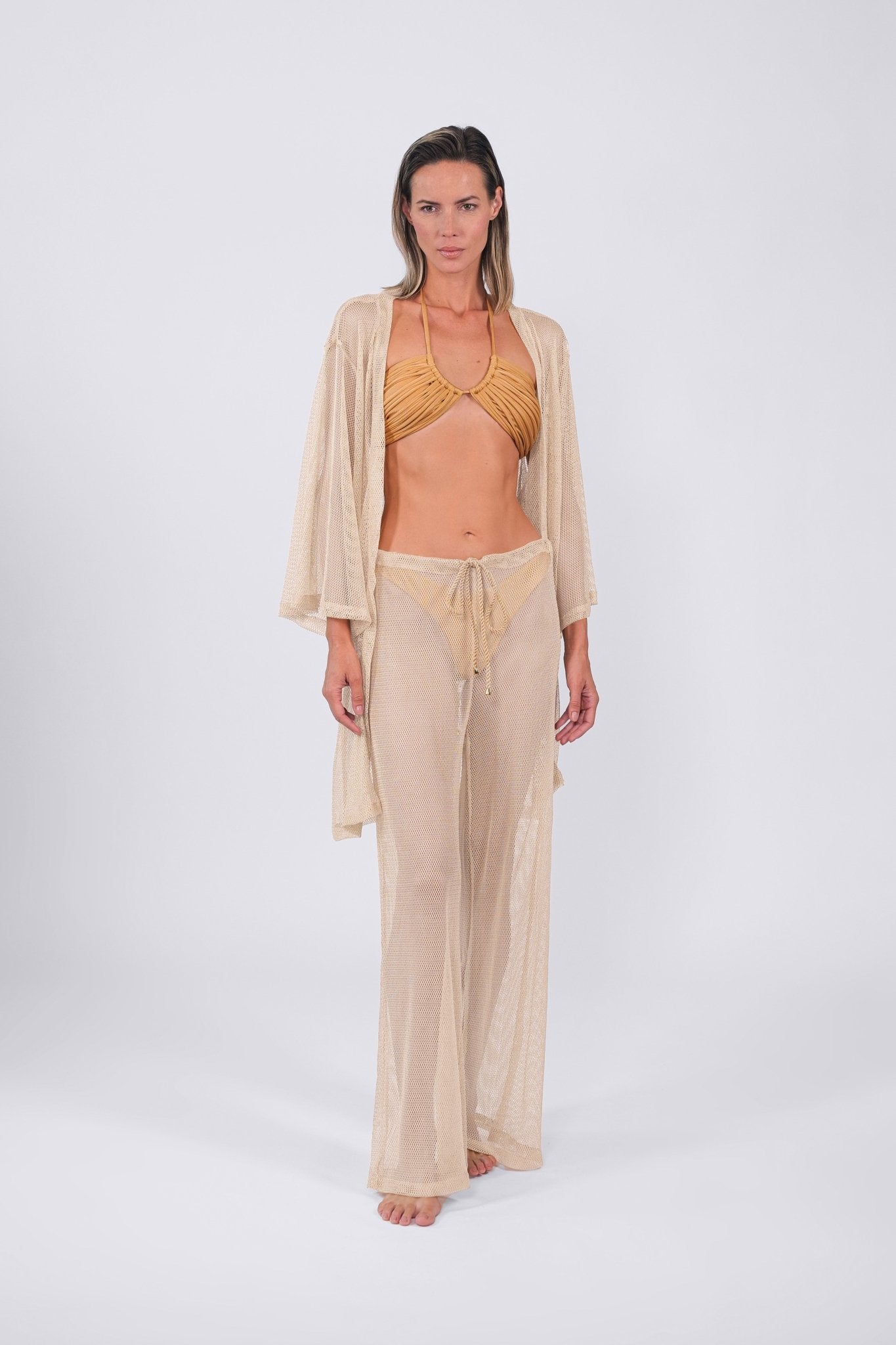 Model wearing the Buzios belted Kimono in Golden Beige.